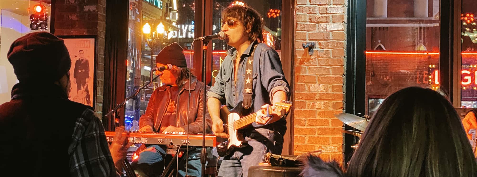 bar singer on guitar in Daytona Beach