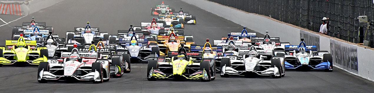 indy cars racing to through the start line Daytona Beach